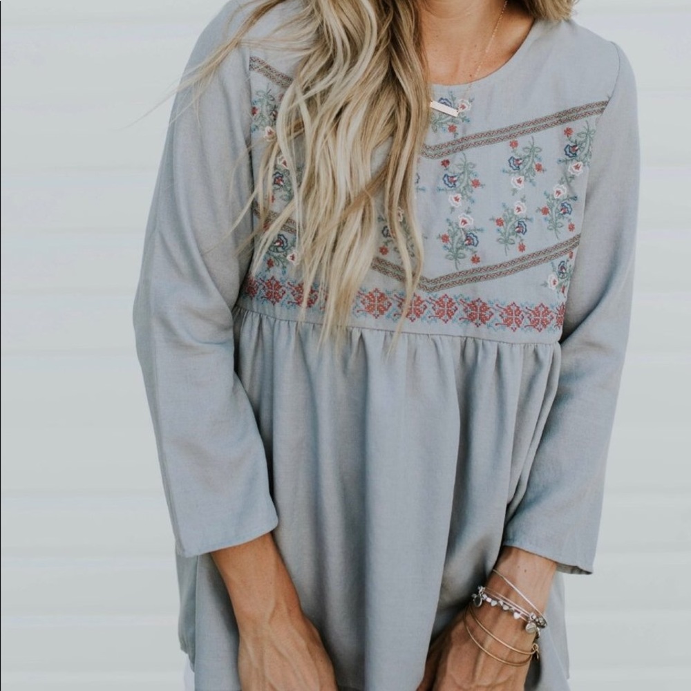 Embroidered peplum top